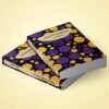 ela couverture est présentée sur la forme d'une pile de deux livres